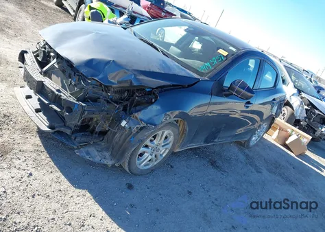 2017 Toyota Yaris Ia из США, поврежденный, VIN 3MYDLBYV1HY181617